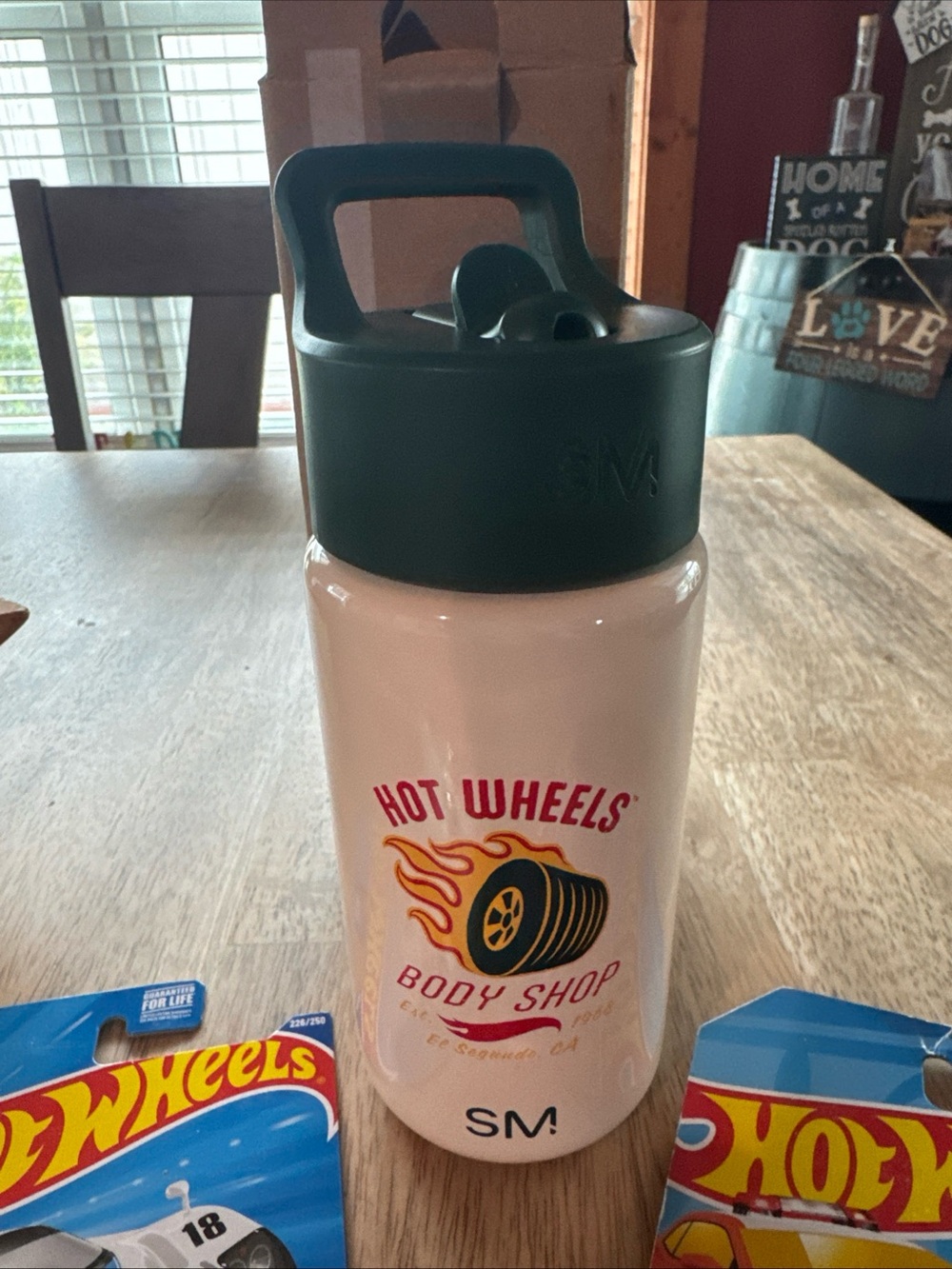 Hot Wheels Kids Water Bottle in white with Dark Green Lid plus two cars